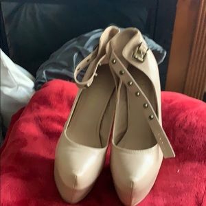 Pink healed shoes with spikes